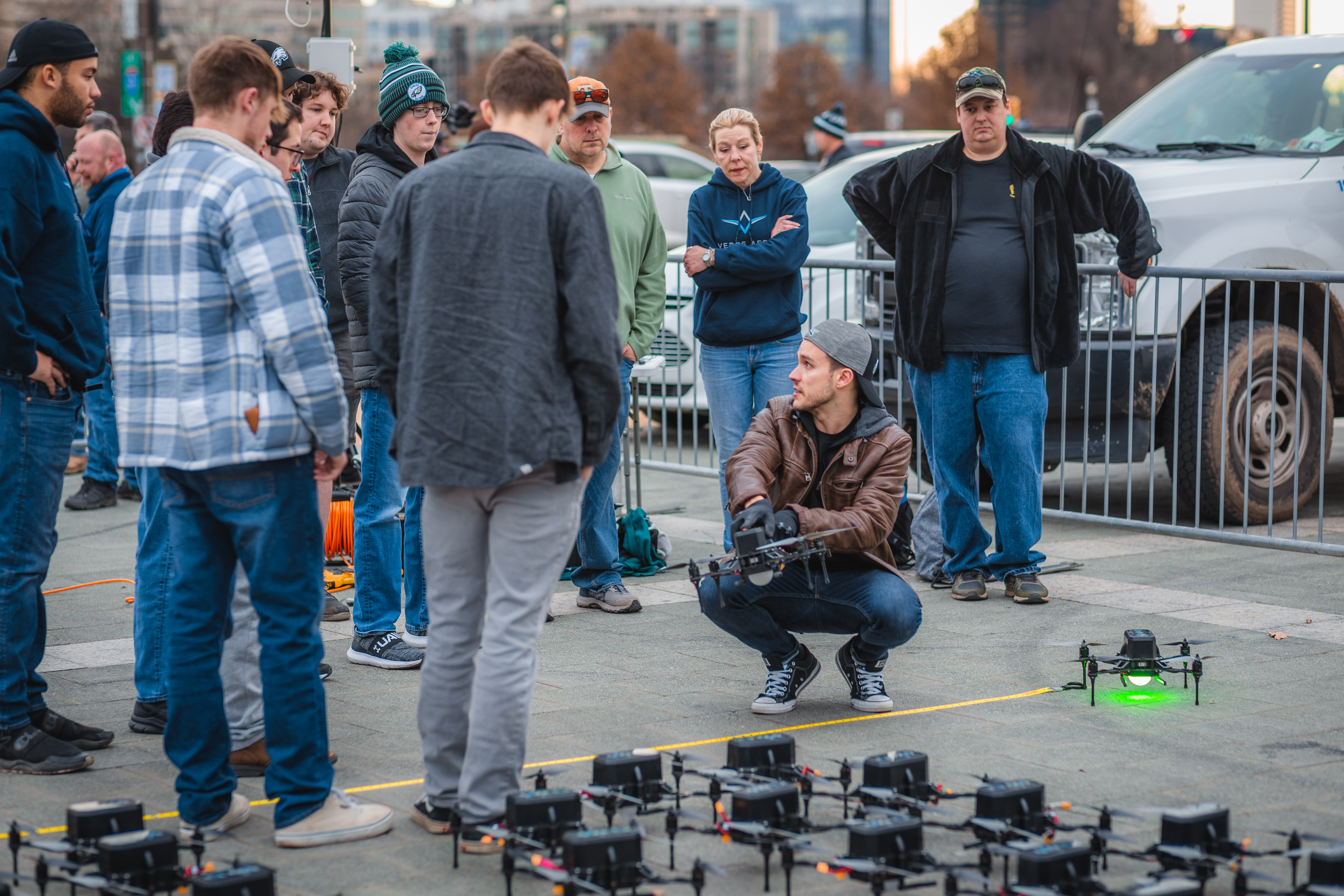 drone technician talking to event guests