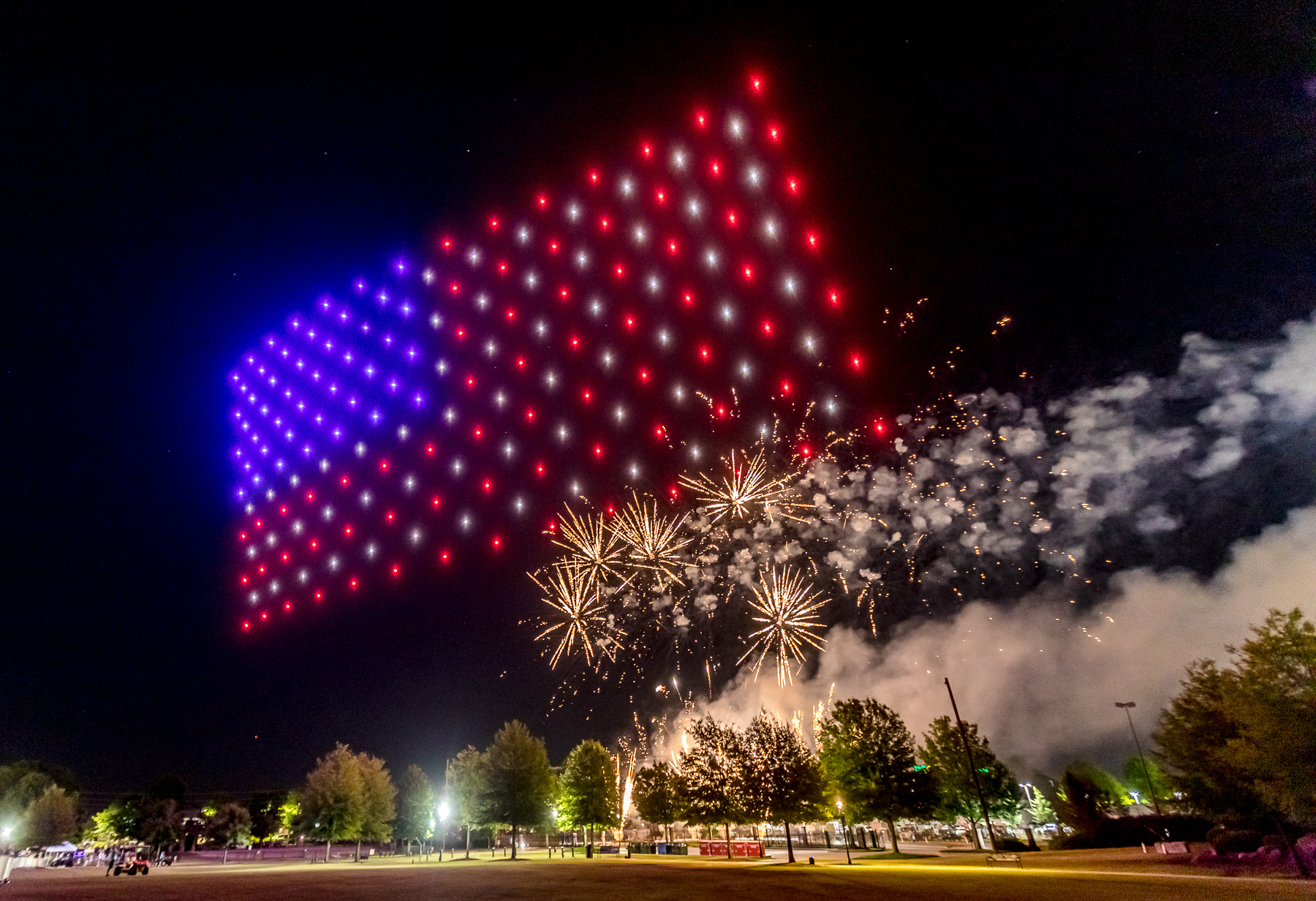 american flag drone show with fireworks